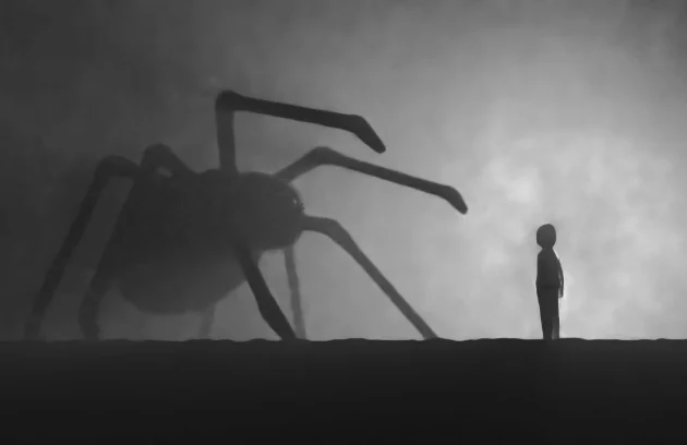 فوبیا و انواع آن عکس یک عنکبوت و کودک در تصویر زمینه خاکستری